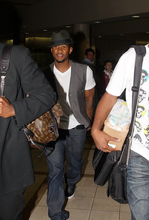 Usher seems really happy that he's about to become a father for the second time. Congrats to him and Tameka.