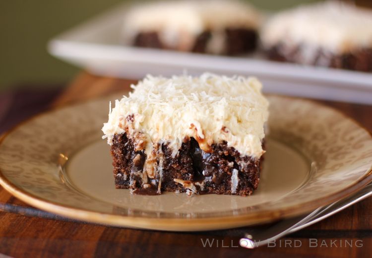 CHOCOLATE POKE CAKE WITH WHIPPED COCONUT ICING