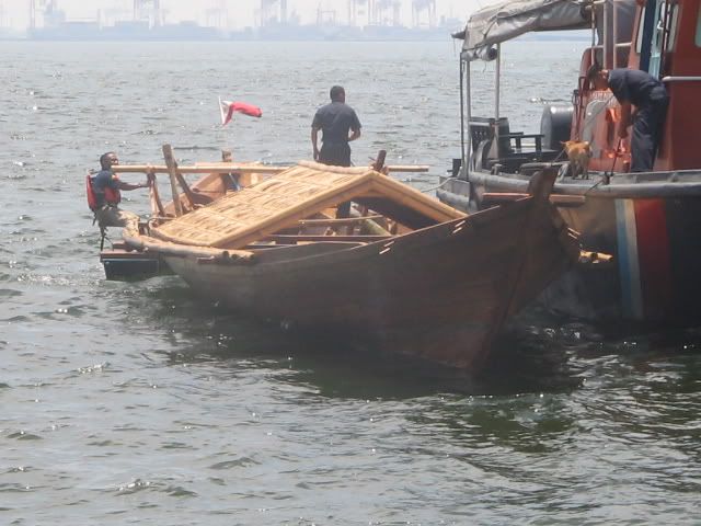 side by side with the navy boat